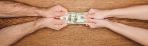 dirty cash passing back and forth