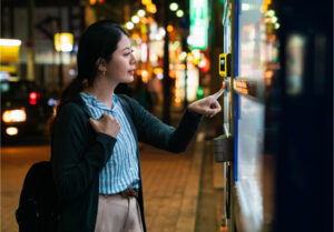 Customer buying at a vending machine business with Nayax VPOS Touch